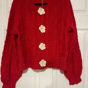 Red Sweater with Floral Accents
